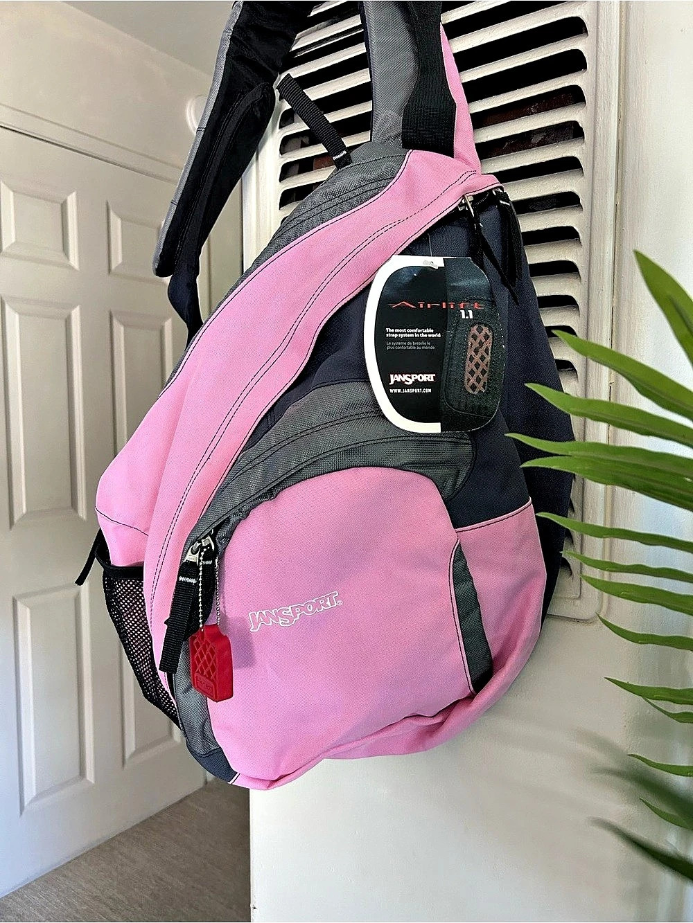 JanSport AirLitit 1.1 Sling Backpack Pink & Black NWT